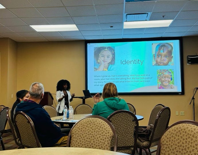 Photo of Mihret Cheeks giving a presentation.